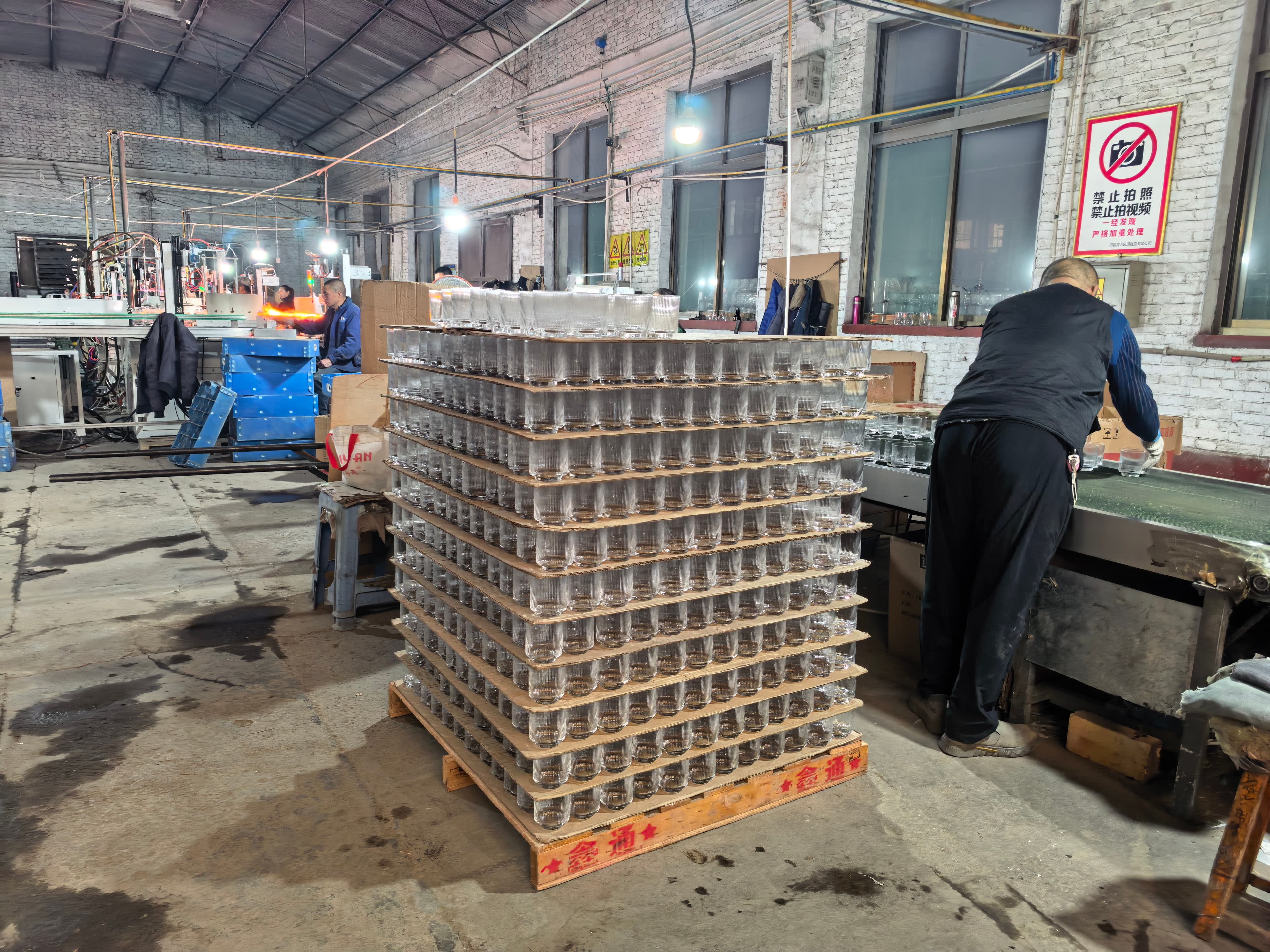 Production floor with stacked glass cups